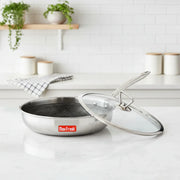 Max Fresh stainless steel frying pan with honeycomb non-stick surface and glass lid on kitchen counter